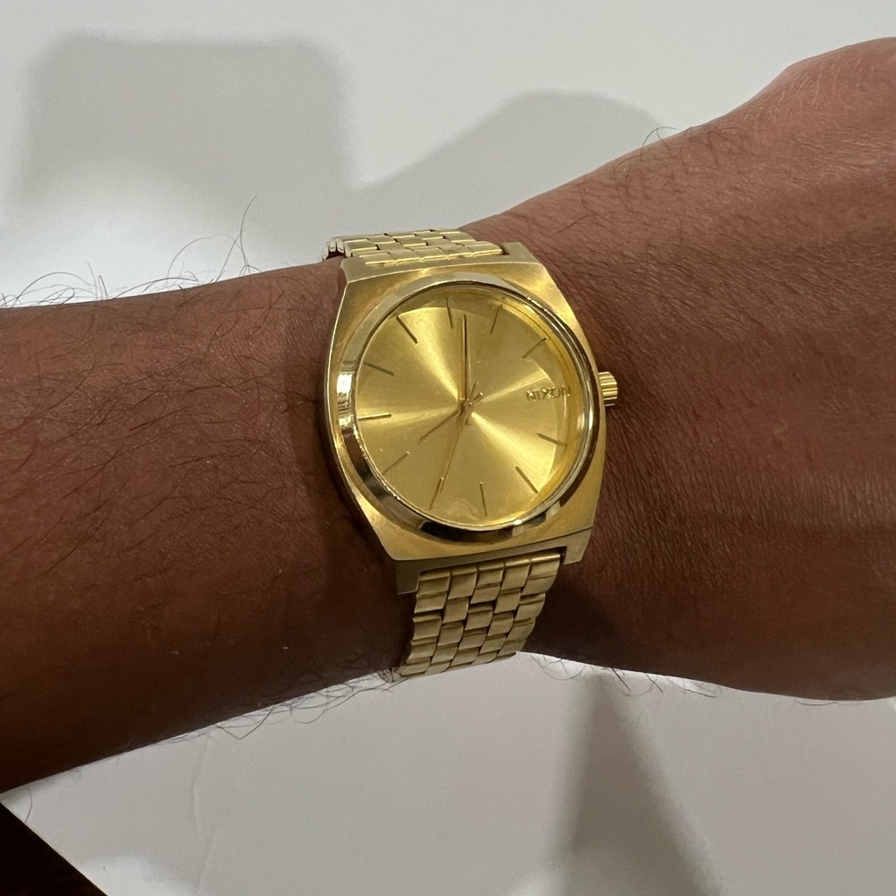 Gold Nixon watch